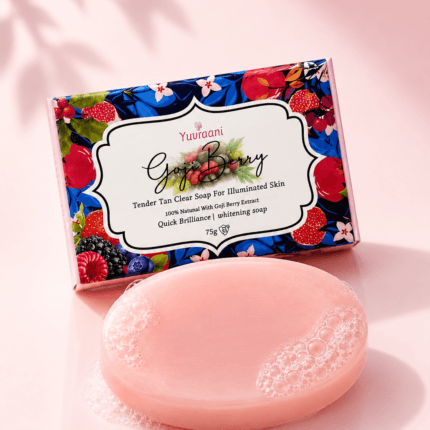 Yuvraani Goji Berry Tan Clear Soap with natural Goji Berry extract displayed alongside the soap bar, promoting tan removal, skin brightening, and radiant skin for all skin types.