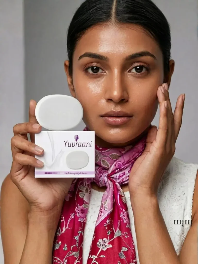 Model holding Yuvraani Whitening Triple Base Soap with product box, highlighting a brightening skincare routine for clear, radiant, and healthy-looking skin.