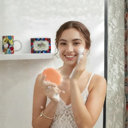 Woman using Yuvraani Goji Berry Tan Clear Soap on her face, demonstrating the rich lather and daily skincare routine for glowing, refreshed skin.
