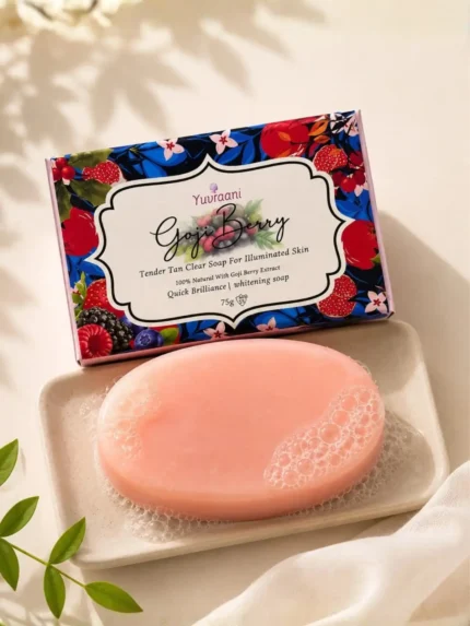Yuvraani Goji Berry Tan Clear Soap with natural Goji Berry extract displayed alongside the soap bar, promoting tan removal, skin brightening, and radiant skin for all skin types.